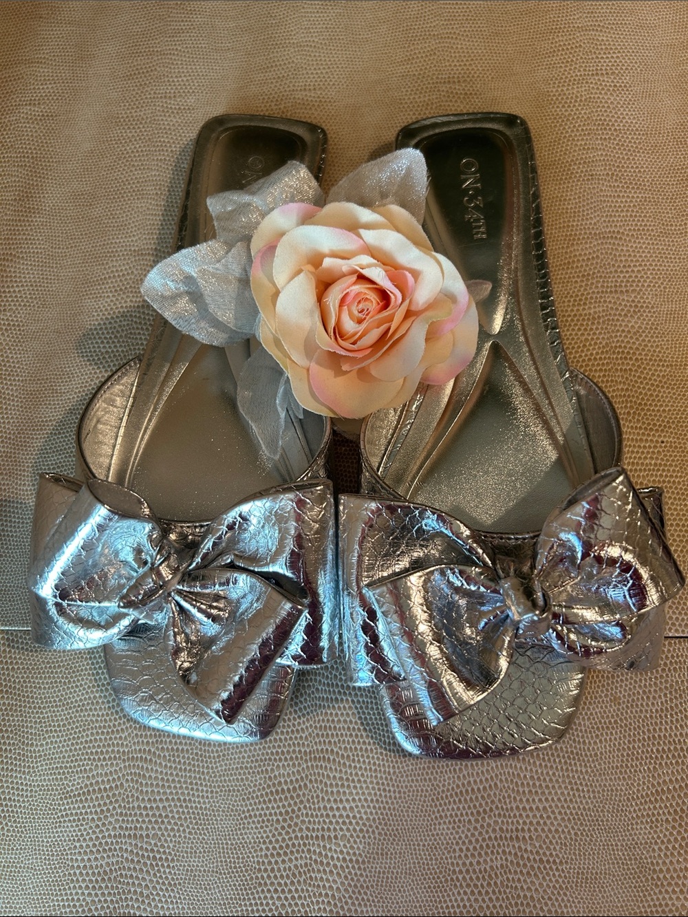 NWOT Metallic Silver Slide Flats with Floral Accent